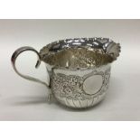 A heavy Edwardian silver half fluted cream jug. Sh