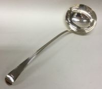 A heavy George III OE pattern silver soup ladle. L