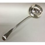 A heavy George III OE pattern silver soup ladle. L