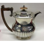 A good heavy George III silver coffee pot of half
