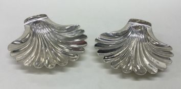 A pair of novelty Georgian silver butter shells of