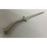A novelty silver letter opener in the form of a fi