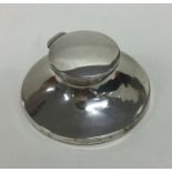 A silver capstan shaped inkwell. Birmingham. Appro
