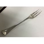 An early mid 18th Century three prong silver fork.