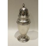 An Edwardian silver caster with panelled sides. Sh