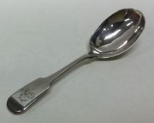A large fiddle pattern silver caddy spoon. London