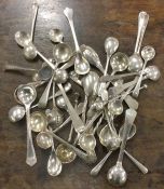 A bag containing a large collection of salt spoons