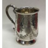 A good quality engraved silver christening cup on