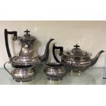 An EPNS Adams' style four piece silver plated tea