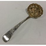NEWCASTLE: A crested silver berry sifter spoon. 18