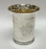 A large Victorian silver beaker attractively crest