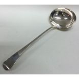 A heavy George III plain silver soup ladle. London