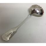 A Victorian silver fiddle pattern sifter spoon dec