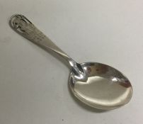 An American silver caddy spoon decorated with 'Lit