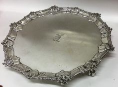 A Georgian silver circular salver attractively cre