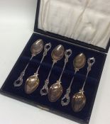 An attractive cased set of six Edwardian silver co