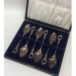 An attractive cased set of six Edwardian silver co