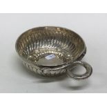 A heavy Antique silver bleeding bowl of fluted des