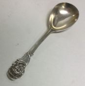 A novelty silver caddy spoon of fluted design. Lon