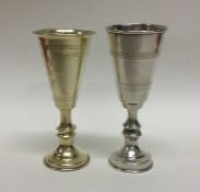 A matched pair of tapering silver goblets. Approx.