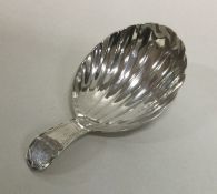 A George III silver caddy spoon. Birmingham 1792.