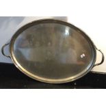 A large oval Georgian silver two handled tray with