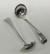 A pair of silver plated sauce ladles with crested