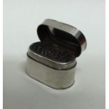 A large Georgian silver oval double hinged top nut