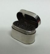 A large Georgian silver oval double hinged top nut