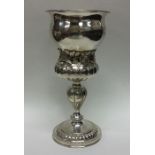 A heavy Continental silver goblet decorated with f