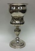 A heavy Continental silver goblet decorated with f