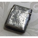An engraved silver vesta with hinged top. Birmingh