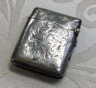 An engraved silver vesta with hinged top. Birmingh