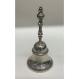 A Continental silver table bell with engraved deco