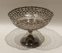 An Edwardian silver pierced sweet dish with shaped