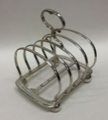 A good quality heavy silver plated five bar toast