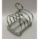 A good quality heavy silver plated five bar toast