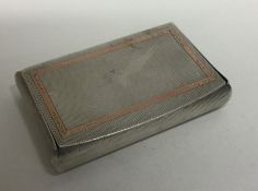 A large engine turned silver table snuff box with