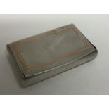 A large engine turned silver table snuff box with