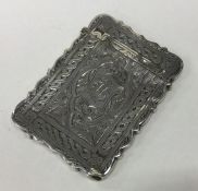 A Victorian silver card case engraved with flowers