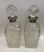 A good pair of Edwardian silver and glass mounted