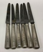 A set of six Georgian silver table knives. Approx.