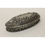An oval Edwardian silver ring box decorated with f