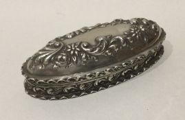 An oval Edwardian silver ring box decorated with f