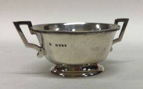 A Victorian silver two handled salt engraved with