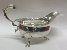 A good George II silver sauce boat with card cut r
