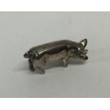 A heavy cast silver figure of a pig. Approx. 17 gr