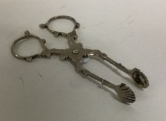 A pair of early Georgian silver scissors with shel