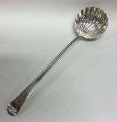 A mid 18th Century crested silver soup ladle. Appr