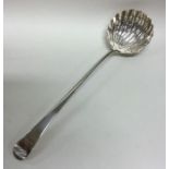 A mid 18th Century crested silver soup ladle. Appr